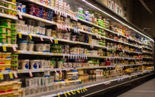 supermarket aisle with signs and products-finding clarity