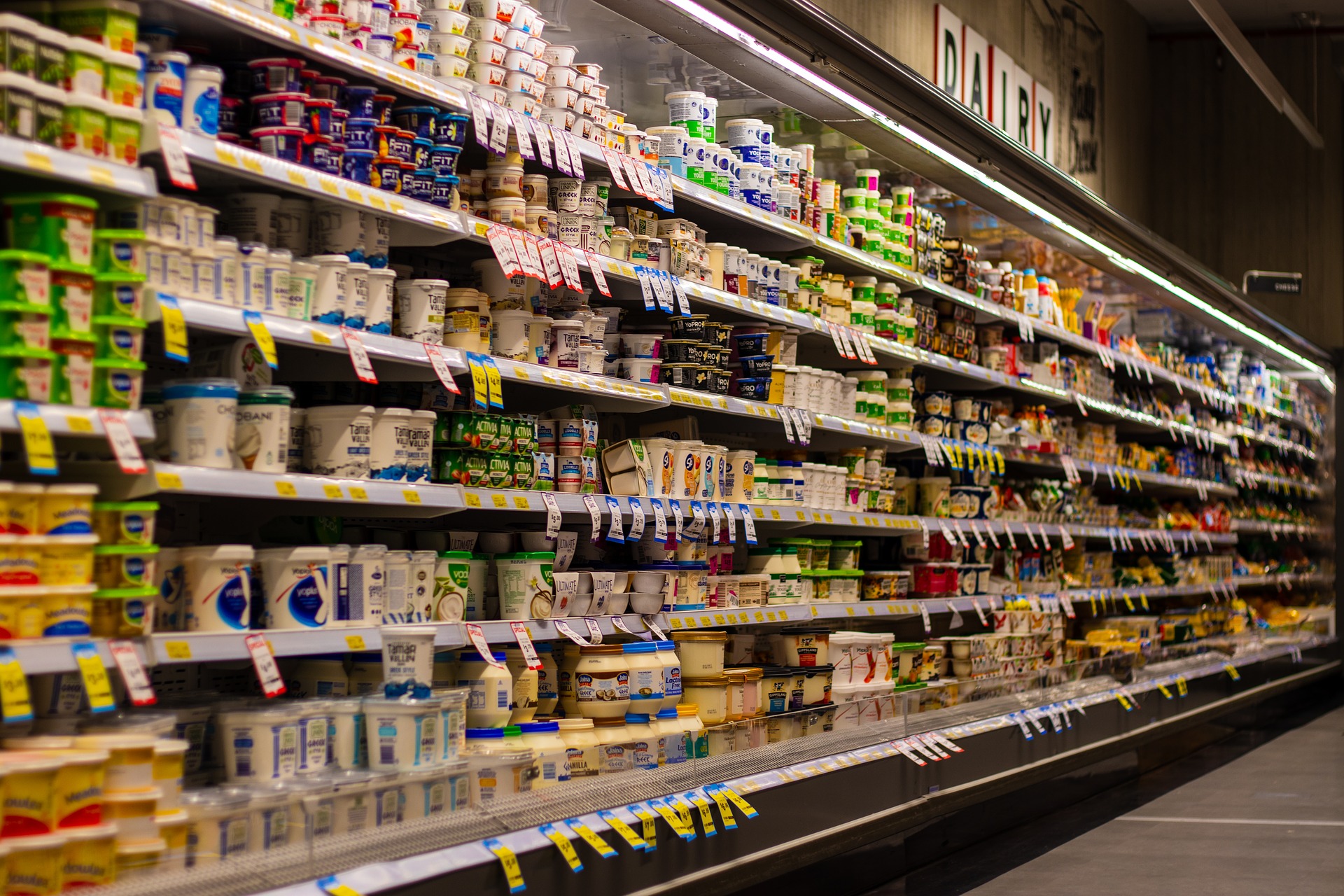 supermarket aisle with signs and products-finding clarity