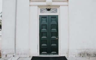 a front door closed to the community
