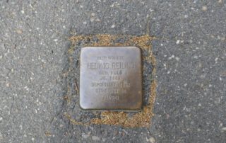 a brass memorial, stumbling stone, to remember someone killed by the Nazis-Mainz, Germany