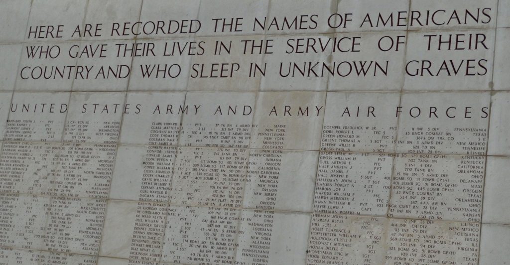 names of missing soldiers engraved on a stone wall at the Luxembourg American Cemetery