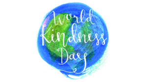 Colorful watercolor globe with the text "World Kindness Day" artistically crafted in white cursive lettering.